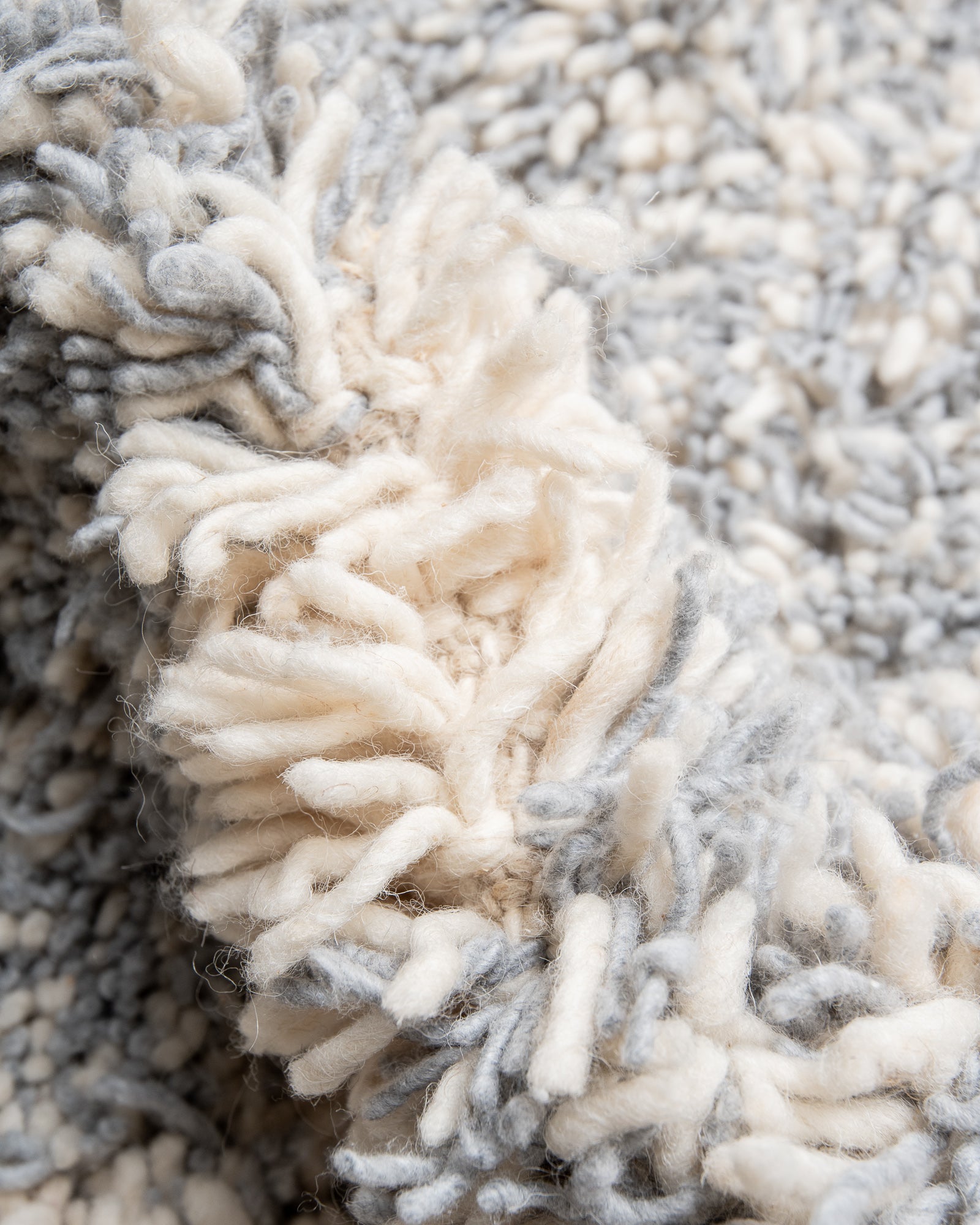 Modern, designer, handcrafted Berber rug from Morocco. Beniourain carpet with beautiful colours and patterns and fluffy wool texture.